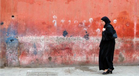 Woman Walking in Marrakech, by DavidDennisPhotos.com via Flickr CC