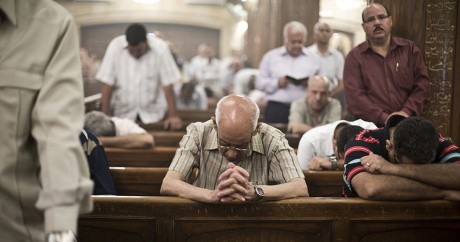 Des coptes lors d'une messe au Caire, le 16 mai 2014. VIRGINIE NGUYEN HOANG / AFP